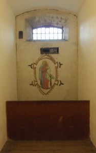 Grace Plunkett's cell with Madonna and Child mural.